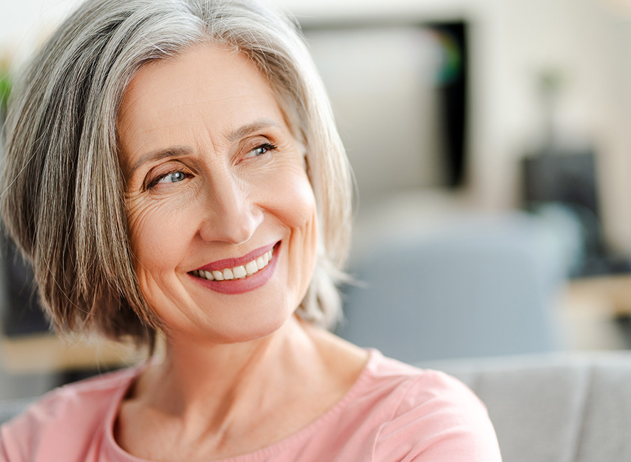 dental patient in Northern Kentucky with new full arch implants