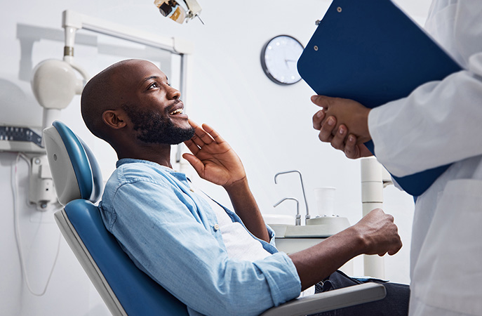 dentist in florence explaining reasons to use sedation