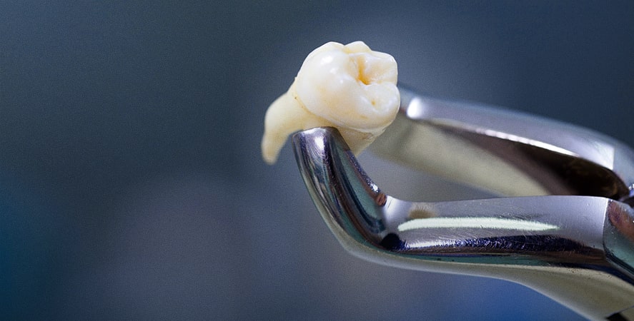 oral surgeon helping a patient in florence